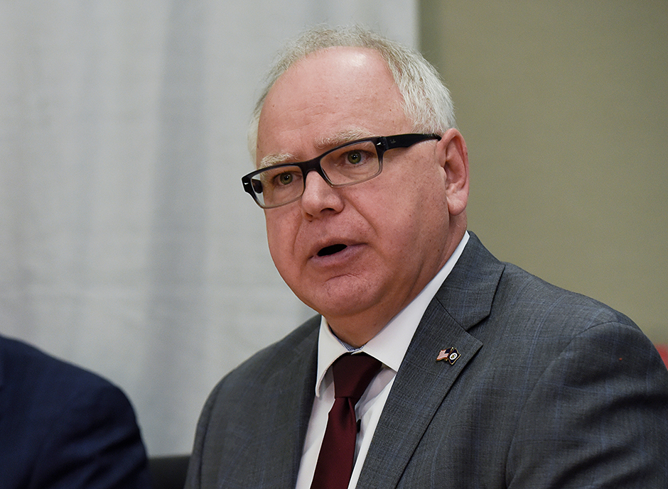 Minnesota governor Tim Walz, addresses the news alongside U.S. Vice President Mike Pence and 3M CEO, Mike Roman, at the 3M company's headquarters in Maplewood
